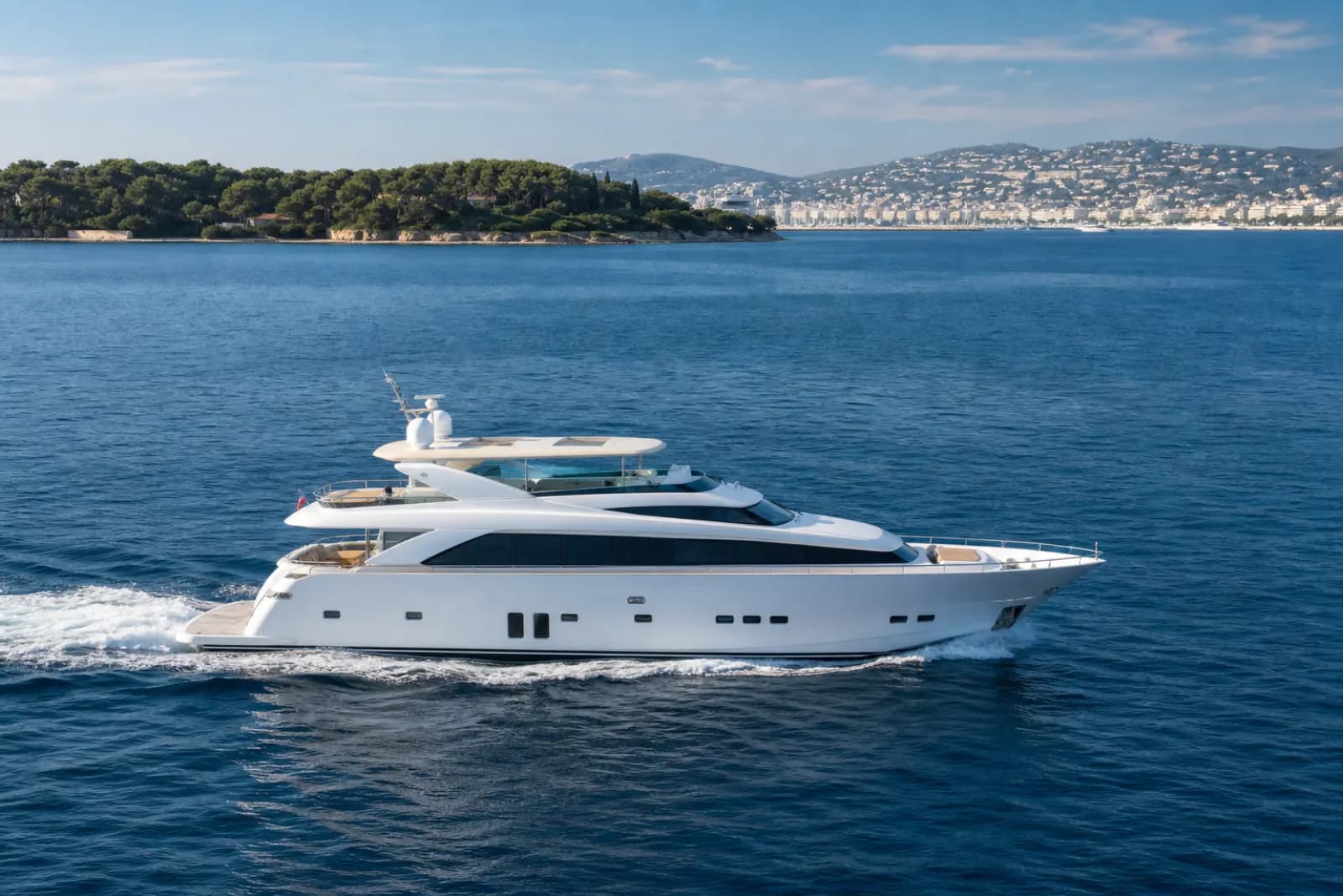 Barcelona yacht charter with a superyacht along the Spanish coast